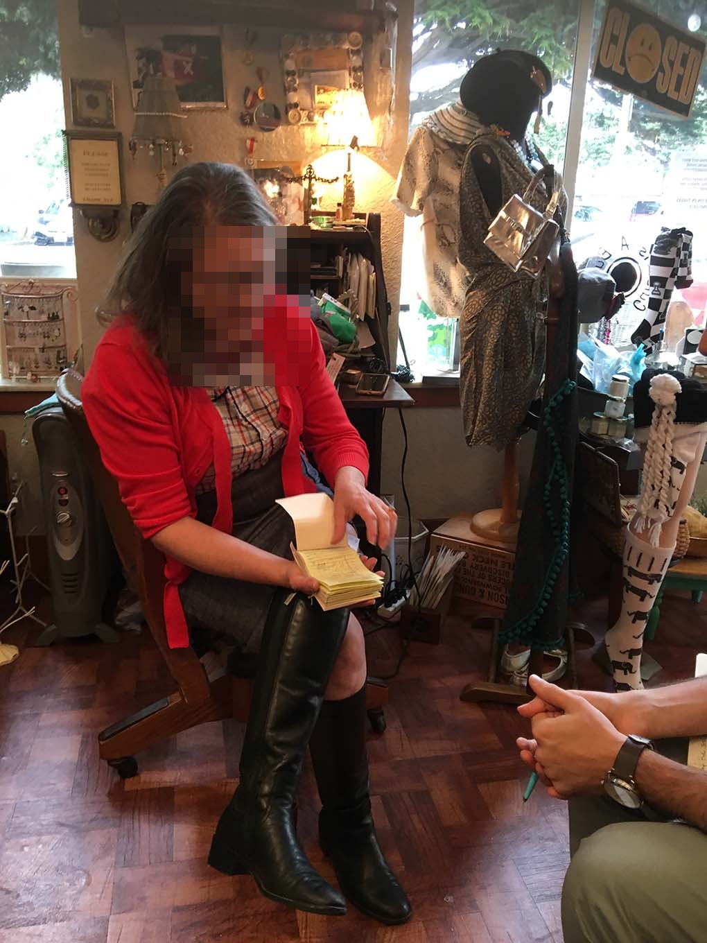 A boutique still reconciling sales from paper receipts.